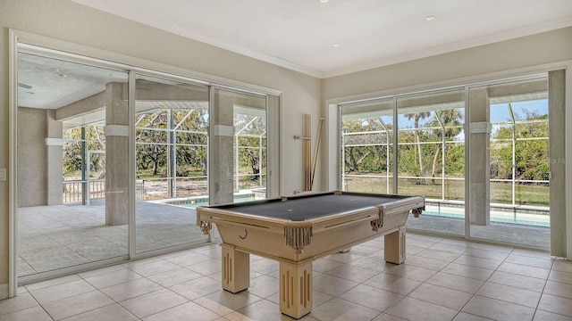 playroom with light tile patterned floors, crown molding, and billiards