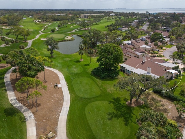 aerial view with view of golf course, a water view, and a residential view