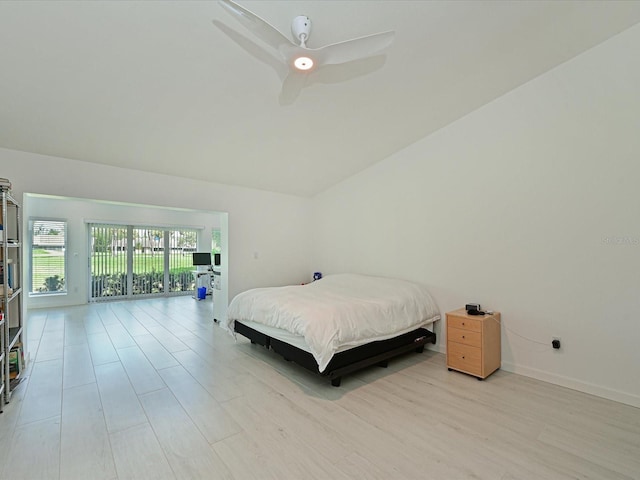 bedroom featuring a ceiling fan, baseboards, vaulted ceiling, access to exterior, and light wood-type flooring