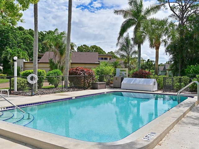 pool featuring fence