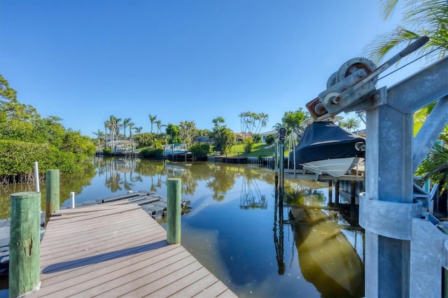 dock area with a water view