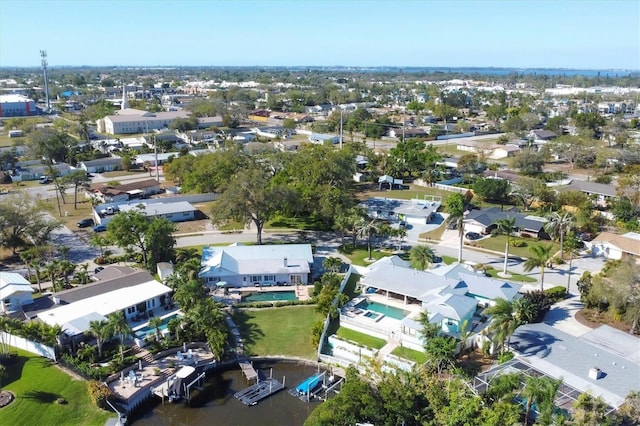 birds eye view of property with a residential view