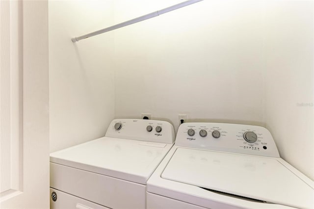 washroom with laundry area and separate washer and dryer