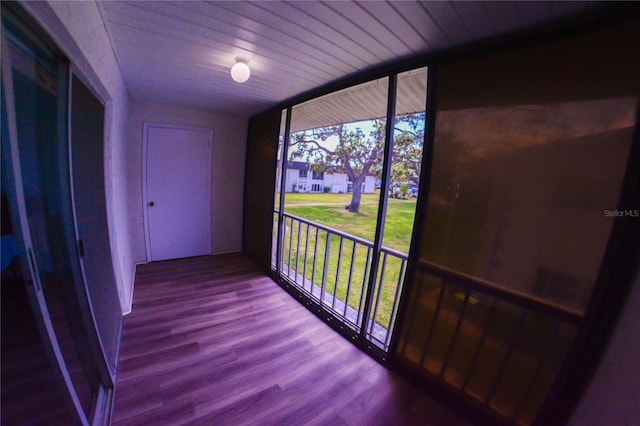 exterior space featuring vaulted ceiling and wood ceiling