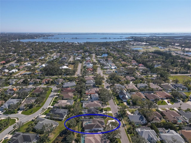 aerial view featuring a water view and a residential view