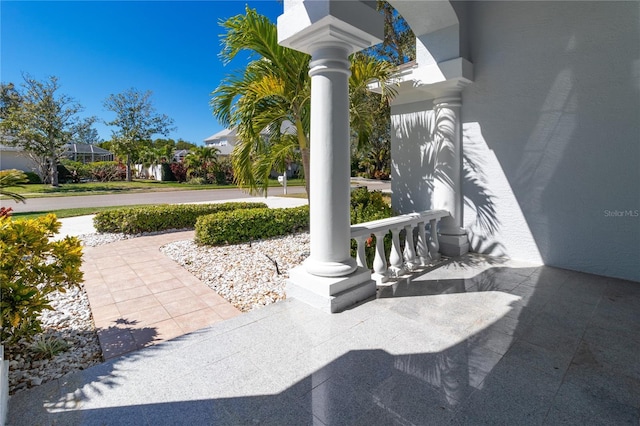 view of patio featuring a porch