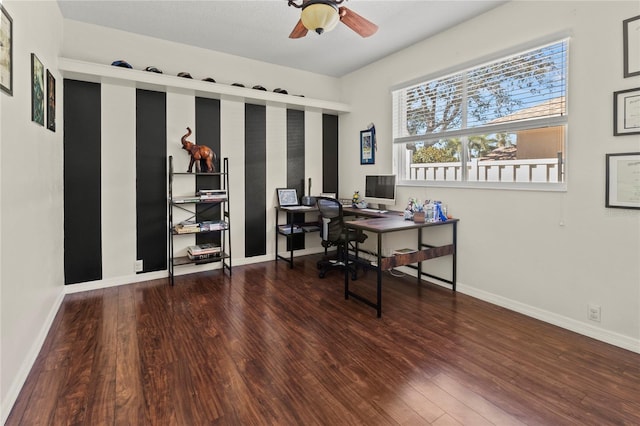 office space featuring ceiling fan, wood finished floors, and baseboards