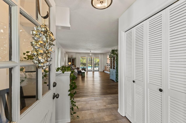 corridor with wood finished floors