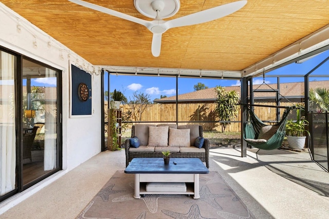 sunroom with wood ceiling