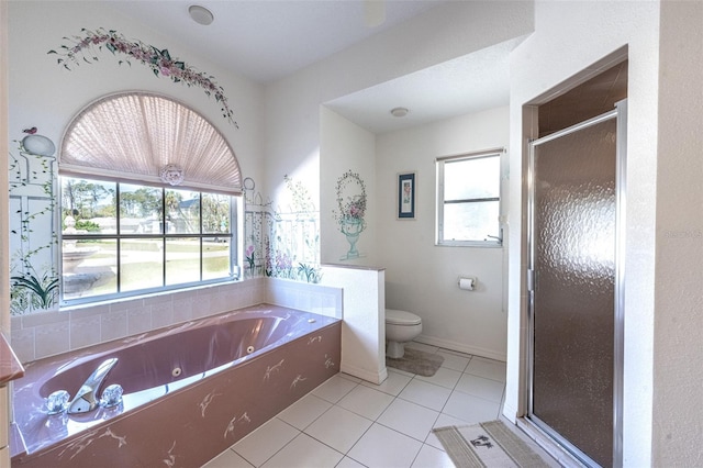 full bath featuring baseboards, a shower stall, tile patterned floors, a jetted tub, and toilet