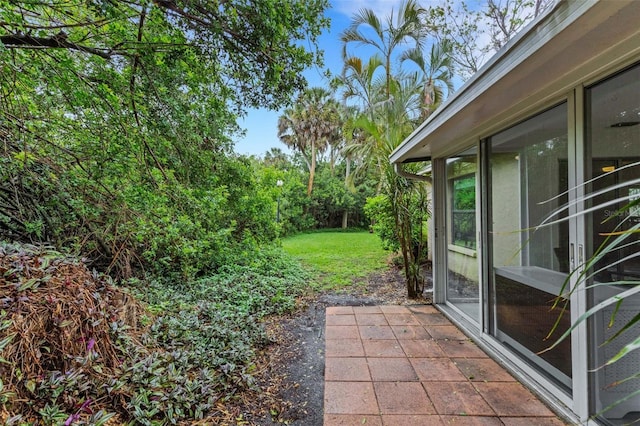 view of patio featuring fence