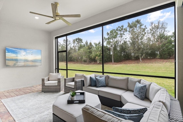 sunroom / solarium with ceiling fan