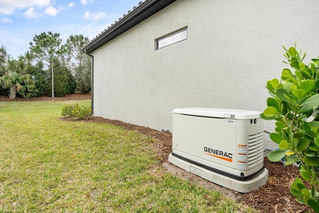 details featuring stucco siding and a power unit