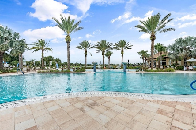 community pool featuring a patio area