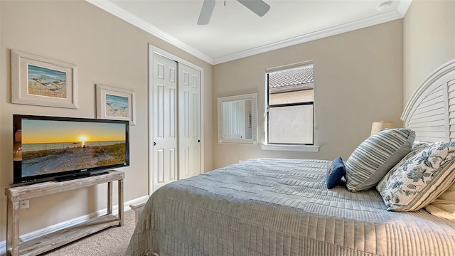 bedroom with baseboards, ceiling fan, ornamental molding, carpet floors, and a closet