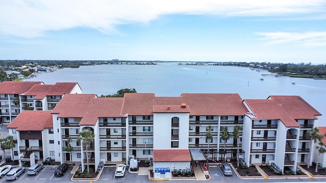 birds eye view of property featuring a water view