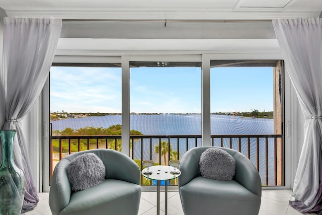 sunroom with a water view