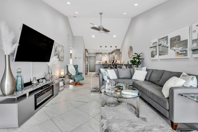 1602 Stickney Point Rd Unit 404, Sarasota, FL 34231 - living room with a ceiling fan, high vaulted ceiling, light marble finish flooring, and recessed lighting