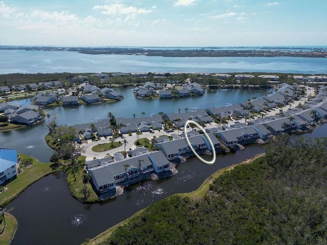 aerial view featuring a water view and a residential view