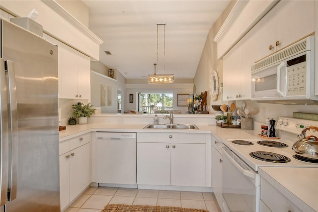 kitchen featuring white appliances, light tile patterned flooring, light countertops, and a sink