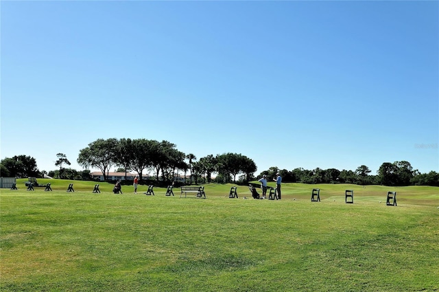 view of home's community featuring a yard