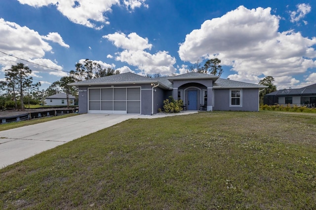 ranch-style house with a front yard, concrete driveway, an attached garage, and stucco siding