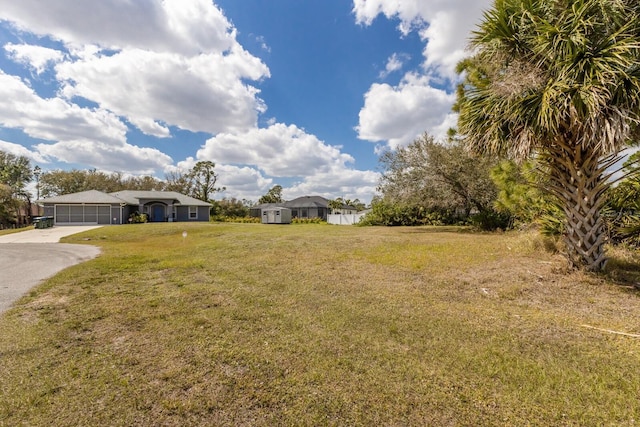 view of yard with a garage