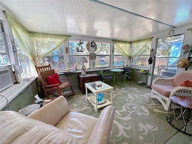 sunroom featuring wood ceiling