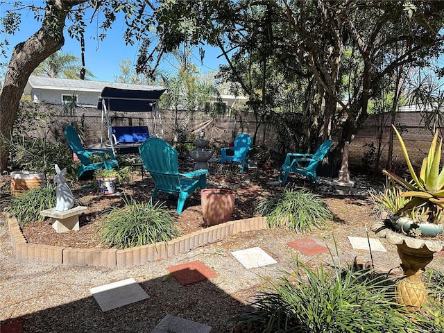 view of yard featuring a fenced backyard