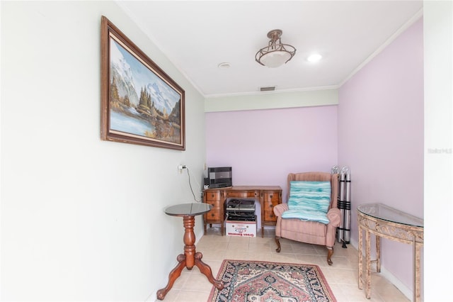 living area with tile patterned flooring, visible vents, and crown molding