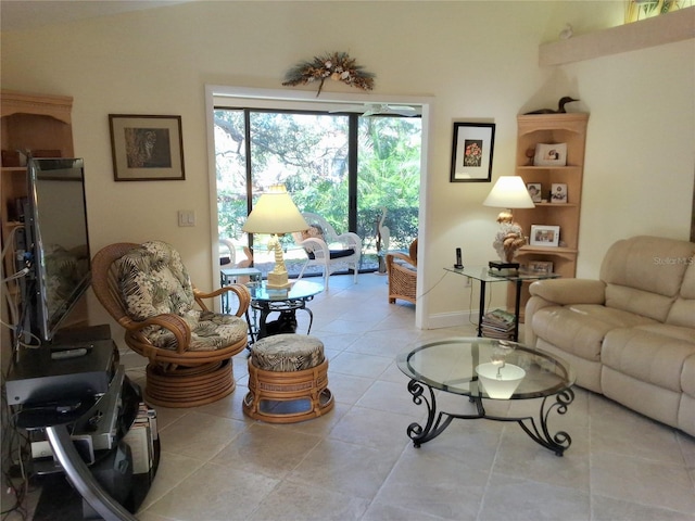 living room with tile patterned flooring