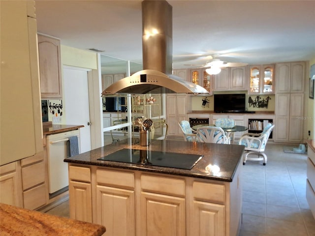 kitchen featuring island range hood, dishwasher, black electric stovetop, light brown cabinets, and light tile patterned flooring