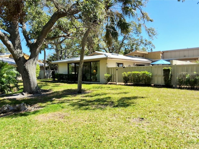 view of yard with fence