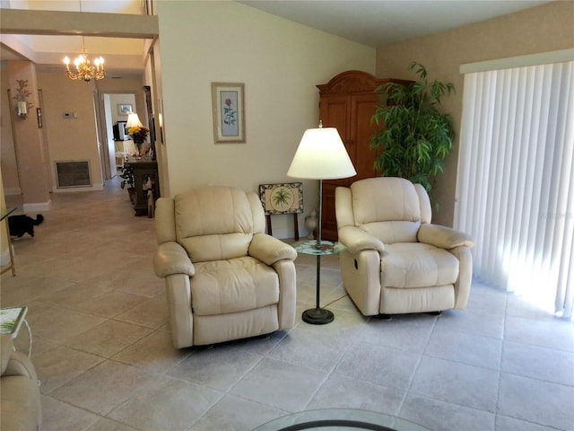 3818 Sun Eagle Ln, Bradenton, FL 34210 - living room featuring visible vents, a notable chandelier, and light tile patterned floors