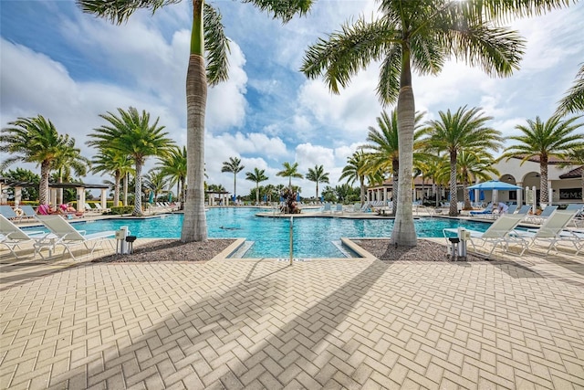 community pool with a patio