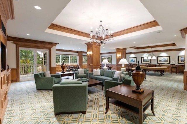 35 Watergate Dr Unit 1103, Sarasota, FL 34236 - community lobby featuring ornamental molding, a decorative wall, a wainscoted wall, and recessed lighting