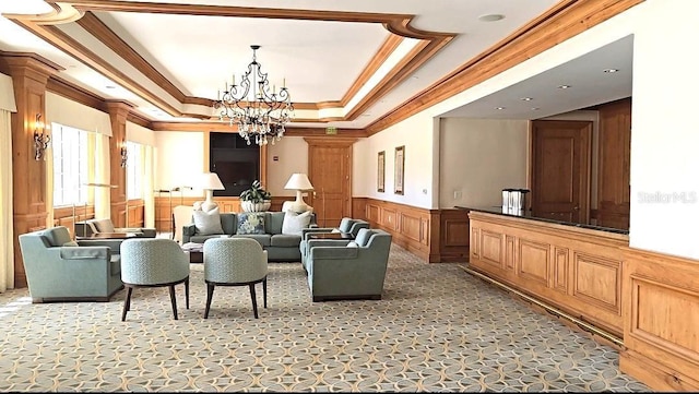 35 Watergate Dr Unit 1103, Sarasota, FL 34236 - community lobby featuring crown molding, wainscoting, and a decorative wall