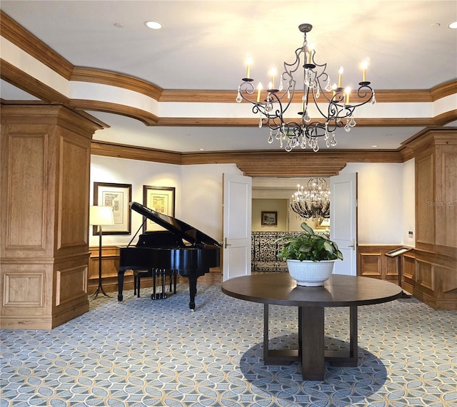 35 Watergate Dr Unit 1103, Sarasota, FL 34236 - sitting room with a chandelier, light colored carpet, crown molding, a decorative wall, and a wainscoted wall