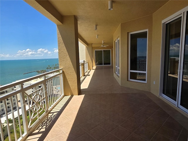 35 Watergate Dr Unit 1103, Sarasota, FL 34236 - balcony with a water view and ceiling fan