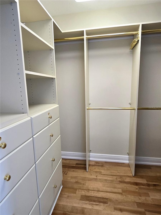 35 Watergate Dr Unit 1103, Sarasota, FL 34236 - spacious closet featuring wood finished floors