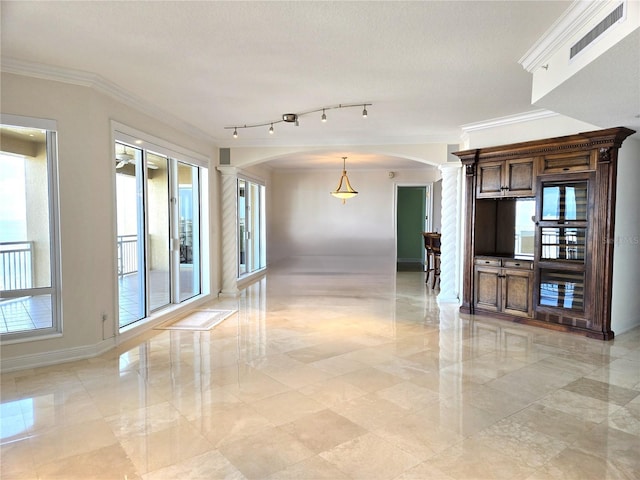 35 Watergate Dr Unit 1103, Sarasota, FL 34236 - hall featuring arched walkways, crown molding, and ornate columns