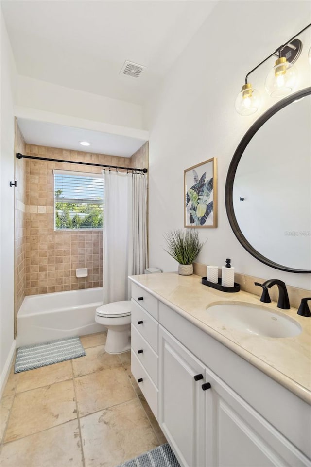 full bathroom with toilet, vanity, visible vents, and shower / tub combo with curtain