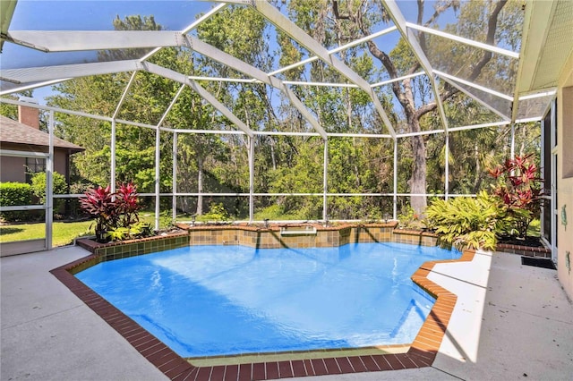 pool featuring a patio area and a lanai