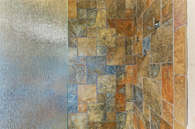 details featuring a tile shower