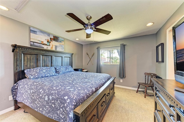 bedroom with recessed lighting, baseboards, light colored carpet, and a ceiling fan