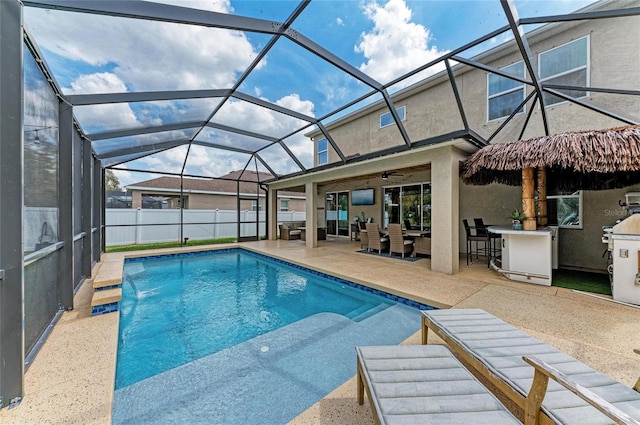 view of pool featuring a fenced in pool, a lanai, a patio, and fence