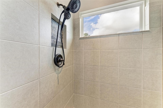 room details with a tile shower