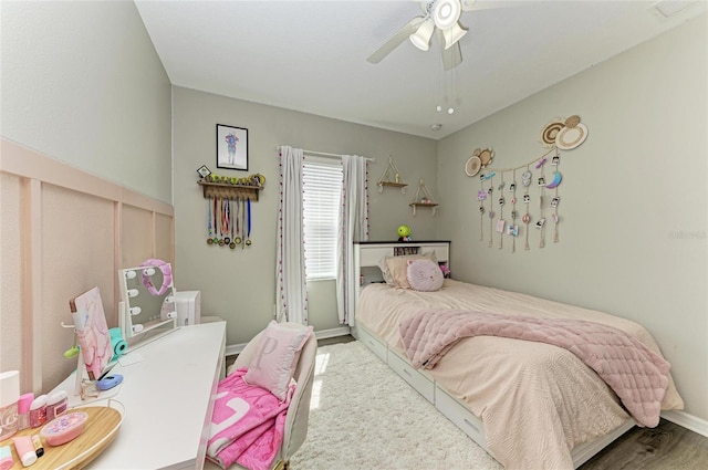 bedroom with visible vents, a ceiling fan, and baseboards