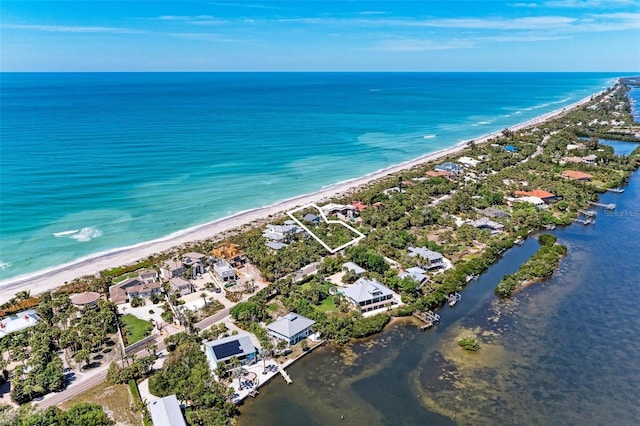 aerial view with a beach view and a water view