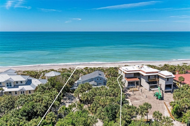 aerial view featuring a view of the beach and a water view